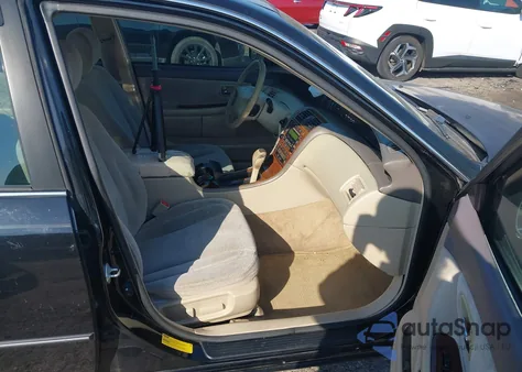 2001 Toyota Avalon Xls z USA, uszkodzony, nr VIN 4T1BF28BX1U118779